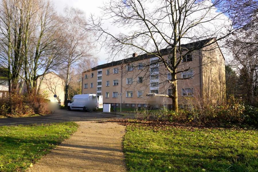 Blick von der Parkanlage auf die Mehrfamilienhäuser