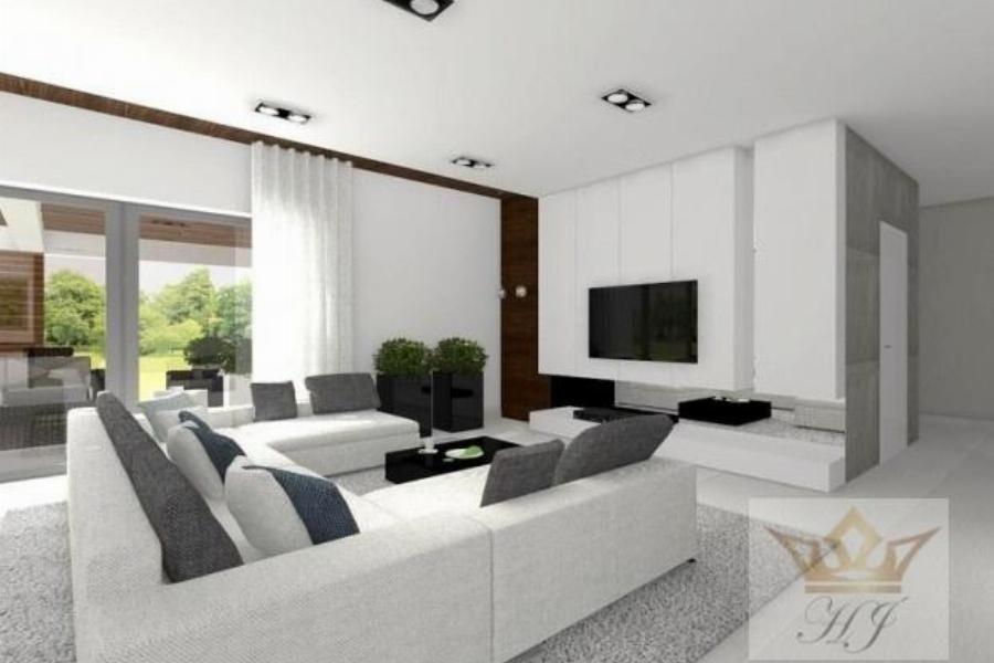 Haus Davos - Größzügiger offener Wohnbereich mit Terrasse_Visualisierung